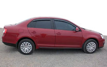 Volkswagen Jetta 2006-2011 гг. Ветровики на окна (4 шт, SIM) фото 1