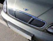 Daewoo Lanos 1998-2017 гг. Зимняя накладка на решетку радиатора (верхняя) фото 2