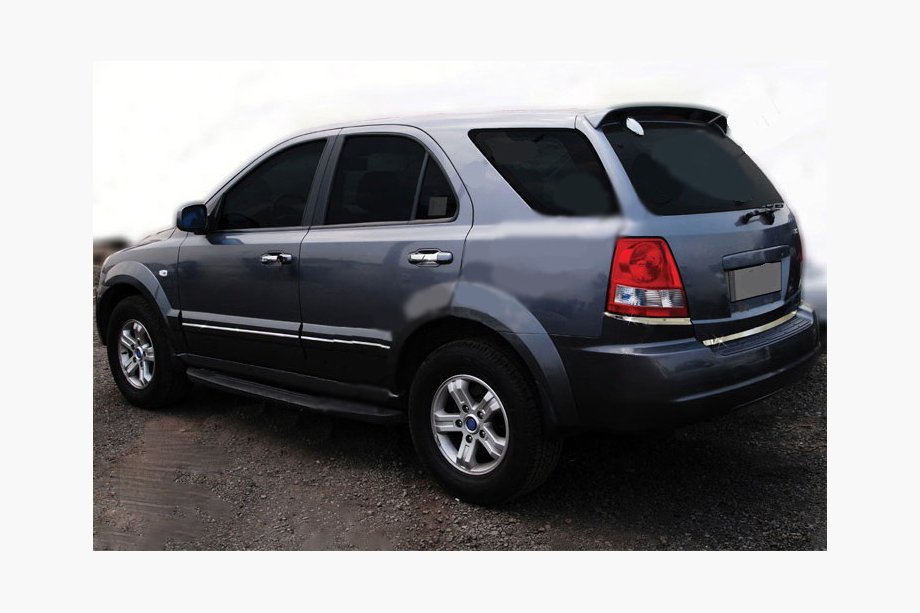 Kia Sorento I BL 2002-2009 гг. Нижние хромированные накладки на задние фонари (2 шт., нержавейка) Image