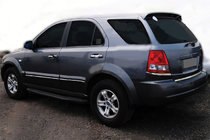 Kia Sorento I BL 2002-2009 гг. Нижние хромированные накладки на задние фонари (2 шт., нержавейка) фото 1