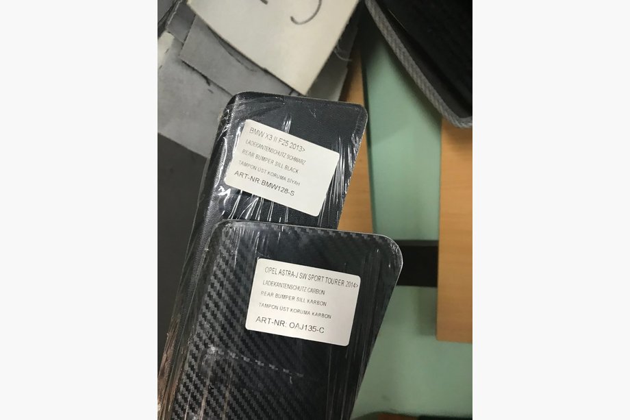 Opel Astra J 2009-2015 гг. Накладка на задний бампер под карбон (SW, нержавейка) Image