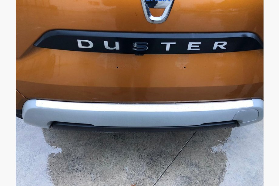Dacia Duster 2018-2024 гг. Накладка на задний бампер Carmos V1 Нержавейка Image
