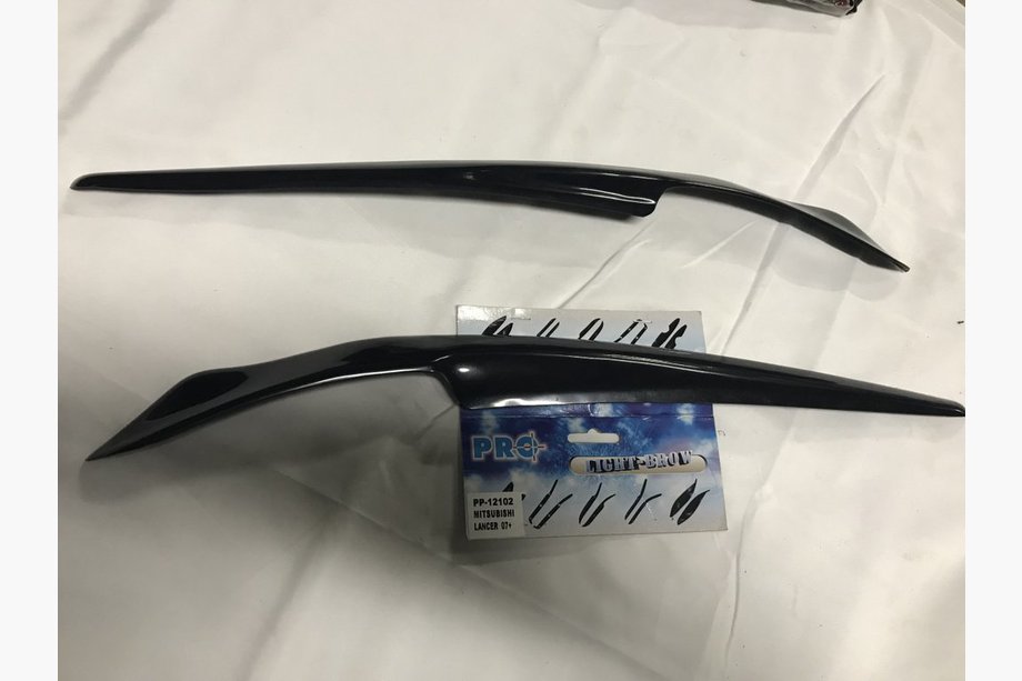 Mitsubishi Lancer X 2008- гг. Реснички на фары (2 шт, под покраску) Image