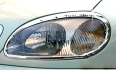 Daewoo Lanos 1998-2017 гг. Накладки на фары (2 шт., Пластик) фото 1