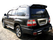 Toyota Land Cruiser 100 1998-2007 гг. Задняя хромированная накладка вокруг номерного знака (пластик) фото 1