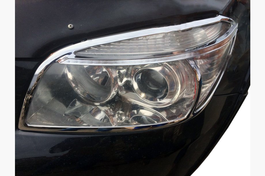 Toyota Rav 4 2006-2013 гг. Накладки на Фары 2006-2009 (2 шт, пластик) Image