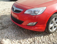 Opel Astra J 2009-2015 гг. Передняя нижняя накладка 2010-2012 (грунт под покраску) фото 1