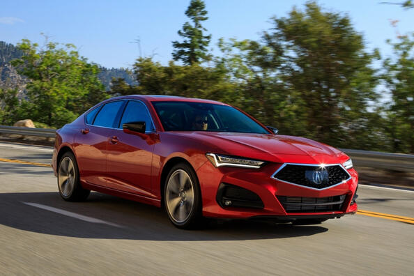Acura TLX II поколение: седан с премиальным статусом фото 2