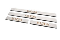 Mazda 2 2003-2007 гг. Накладки на пороги Carmos (4 шт, нержавейка) V-3 фото 2