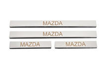 Mazda 2 2007-2014 гг. Накладки на пороги Carmos (4 шт, нержавейка) V-3 фото 1