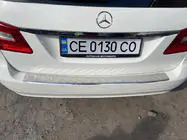 Mercedes E-сlass W211 2002-2009 гг. Накладка на задний бампер Carmos (SW, нержавейка) фото 3