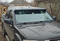 Nissan Navara 2006-2015 гг. Козырек на лобовое стекло (на раме) фото 1