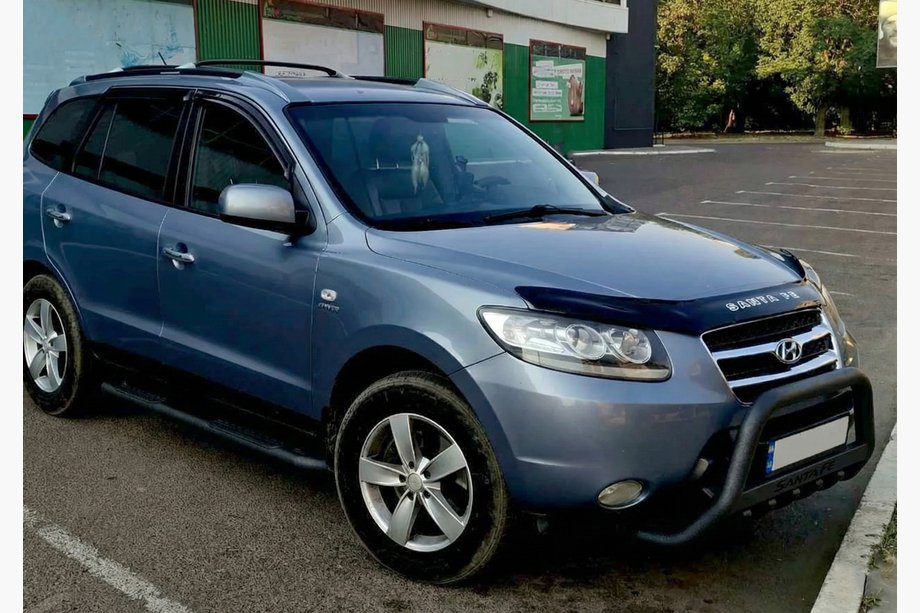 Hyundai Santa Fe 2 2006-2012 гг. Кенгурятник WT004 Черный (Нержавейка) Фото 1