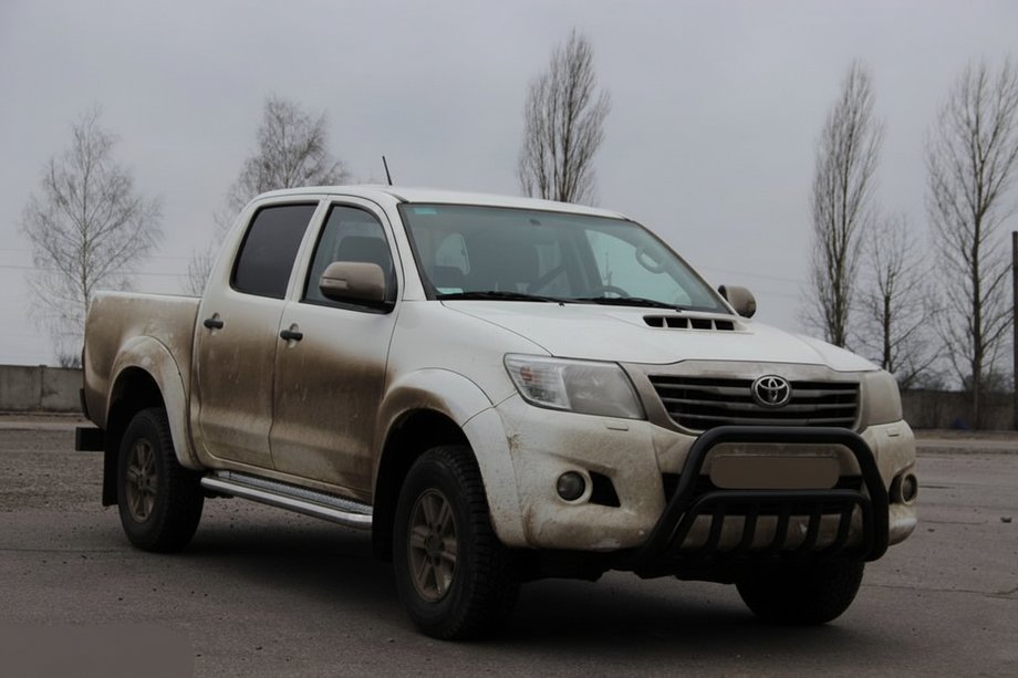 Toyota Hilux 2006-2015 гг. Кенгурятник WT002 Black (нерж.) Фото 2