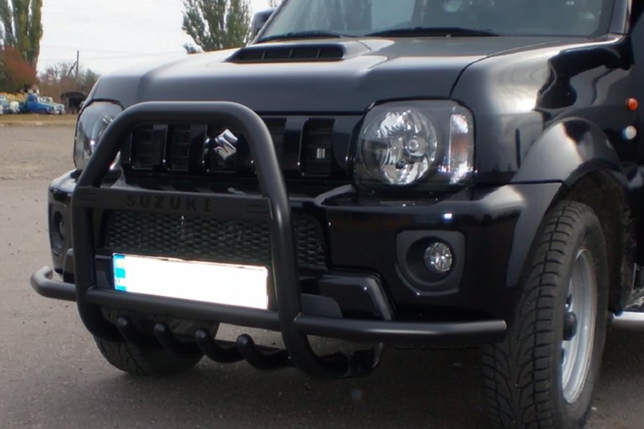 Suzuki Jimny 1998-2018 гг. Кенгурятник QT007-Exclusive Black (с надписью, нерж.) Фото 6
