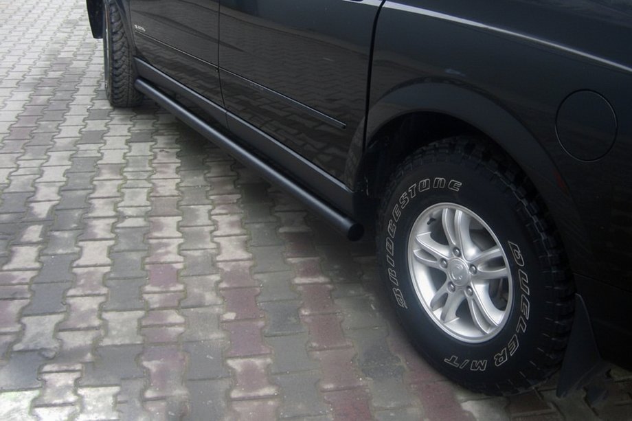 SsangYong Action 2005-2018 гг. Боковые трубы Black (2 шт., нержавейка) Image