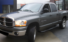 Dodge RAM (DR/DH/D1/DC/DM) 2002–2009 гг. Боковые угловые трубы Black (2 шт., нержавейка) фото 1