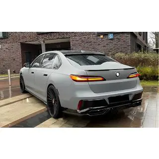 Задний диффузор с насадками на выхлоп (для M760, M-Sport и i7 M70)