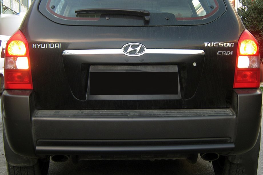 Hyundai Tucson JM 2004- гг. Задняя дуга AK002 Черная (нерж.) Фото 1