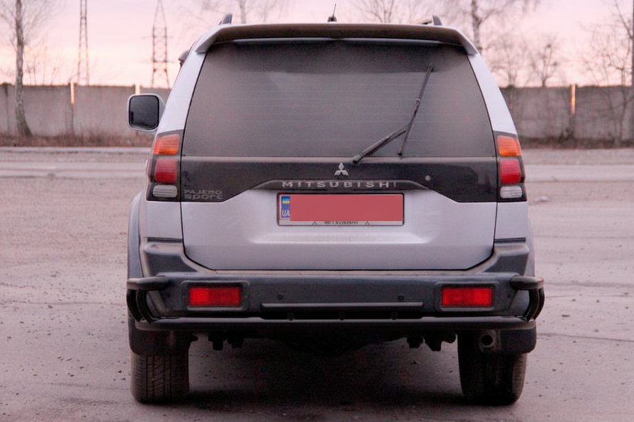 Mitsubishi Pajero Sport 1996-2007 гг. Задняя защита AK005-2 Черный (нерж. сталь) Фото 2