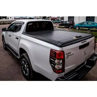 Ролета OEM (механическая с ручкой и замком) Mitsubishi L200 2024- гг. фото 1