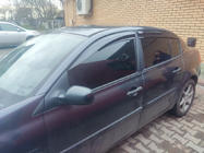 Renault Megane II 2004-2009 гг. Ветровики SD (4 шт, Perflex Sport) фото 1
