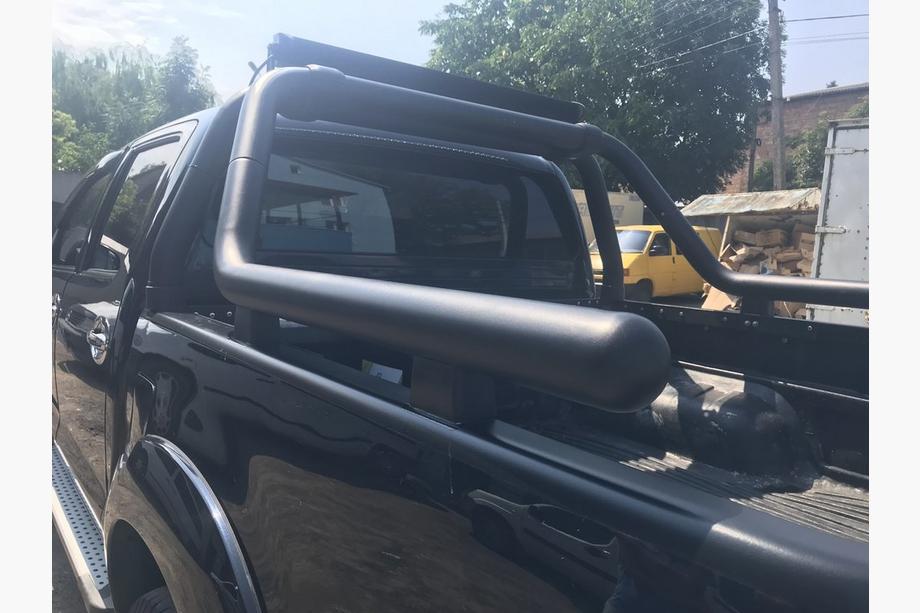 Toyota Hilux 2006-2015 гг. Дуга на кузов (черная) Фото 4