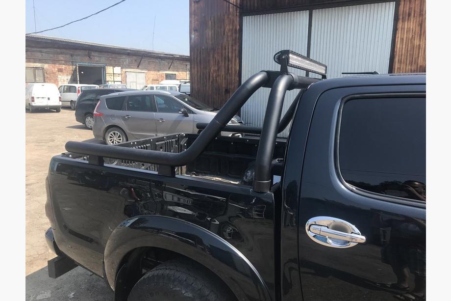 Toyota Hilux 2006-2015 гг. Дуга на кузов (черная) Фото 6