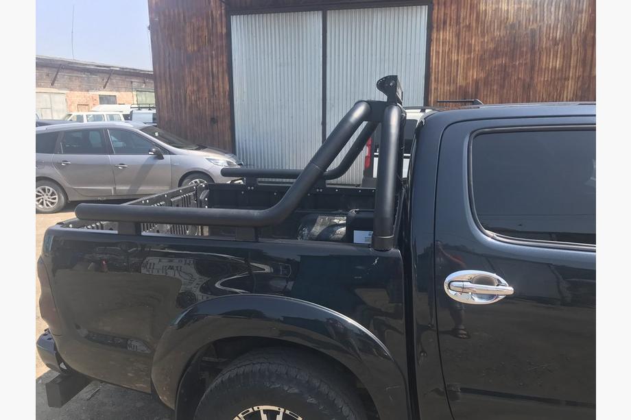 Toyota Hilux 2006-2015 гг. Дуга на кузов (черная) Фото 7