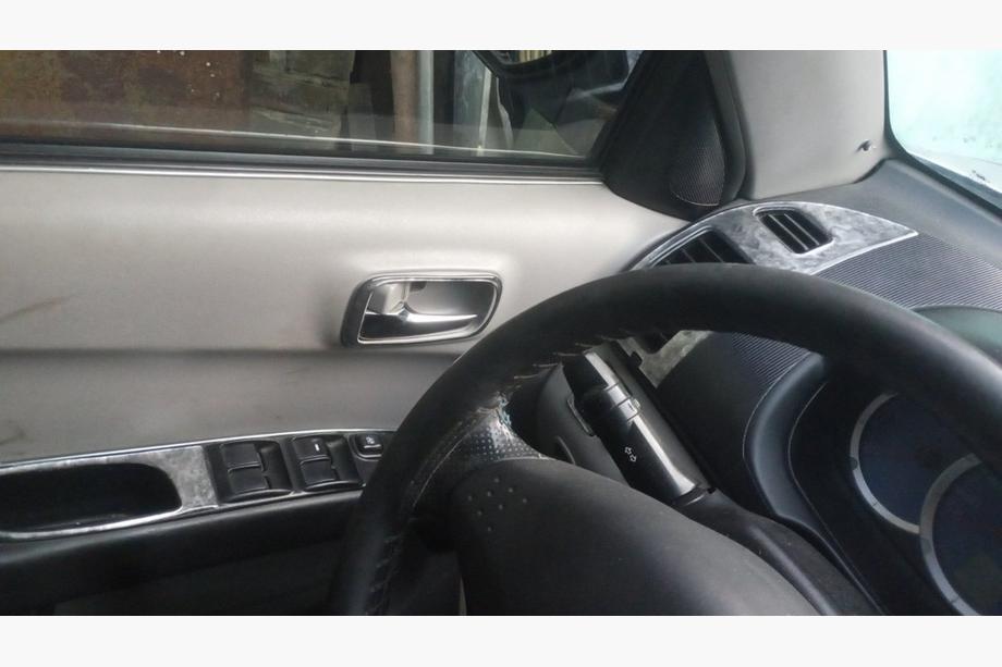 Mitsubishi L200 2006-2015 гг. Накладки на панель приборов (11 деталей) Титан Фото 5