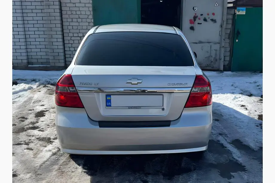 Chevrolet Aveo T250 2005-2011 гг. Накладка на задний бампер с загибом Пластик Фото 1