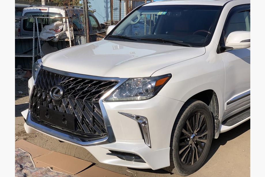 Lexus LX570/450d 2008-2022 гг. Передний бампер для 2008-2015 в стиле рестайлинг (грунтованный под покраску) Черный Фото 12
