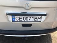 Хромированная накладка над номером (нержавейка) фото 2