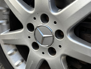 Mercedes-Benz Колпачки на диски 70/75 мм с кольцом (4 шт, серые) фото 3