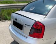 Hyundai Accent 2006-2010 гг. Спойлер LIP (Sunplex, черный) (115,8см x 6,3см) фото 1