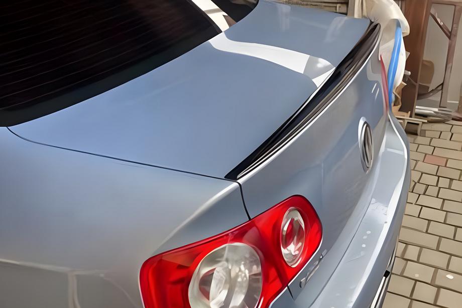 Volkswagen Jetta 2006-2011 гг. Спойлер LIP (Sunplex, черный) (115,8см x 6,3см) Image