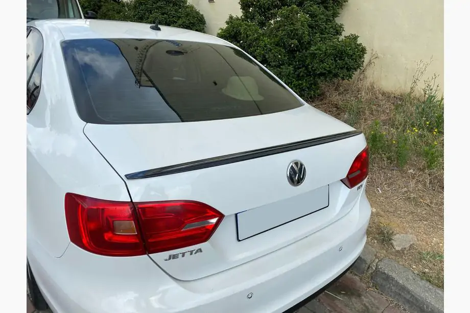Volkswagen Jetta 2011-2018 гг. Спойлер LIP (Sunplex, черный) (115,8см x 6,3см)