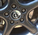 Opel Наклейки на колпачки дисков 54мм (4шт) фото 3