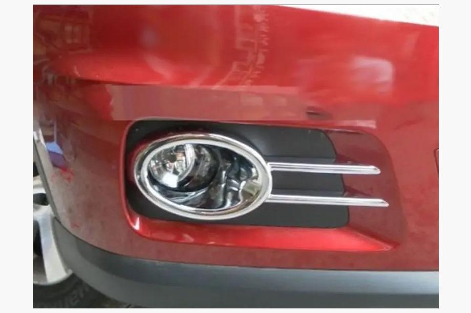 Volkswagen Tiguan 2007-2016 гг. Накладки на противотуманные фары Libao 2011-2016 Off Road (2 шт, пластик) Фото 3