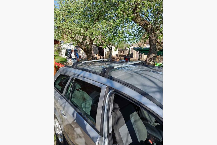 Opel Astra H 2004-2013 гг. Поперечины на интегрированные рейлинги с замком Skybar V2 (2 шт) Image