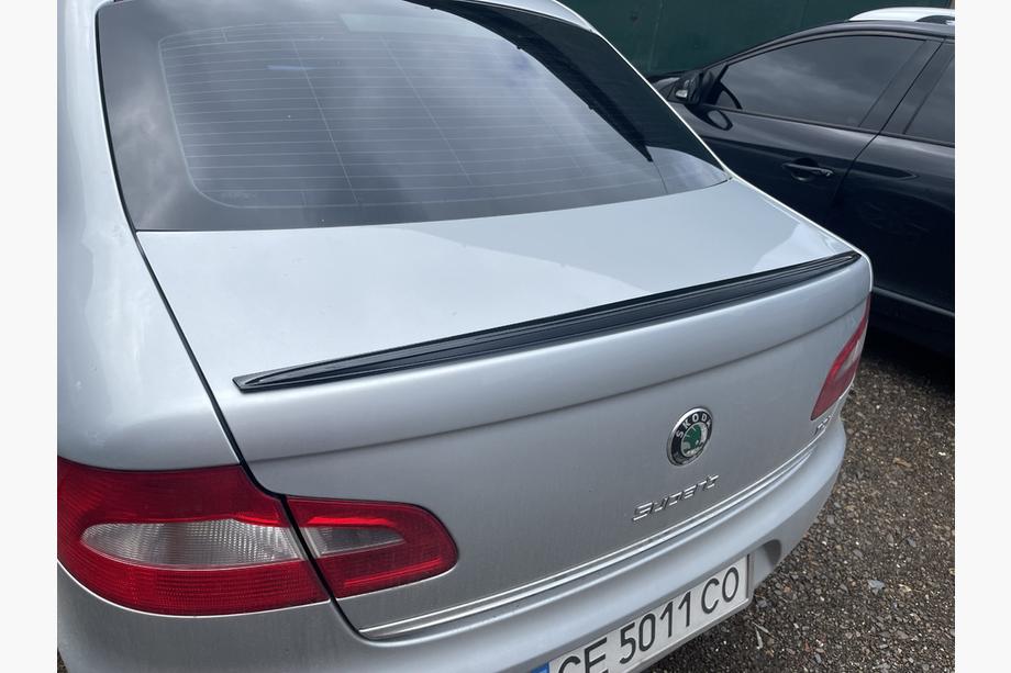 Skoda Superb 2009-2015 Спойлер LIP (Sunplex, черный) (115,8см*6,3см) Image