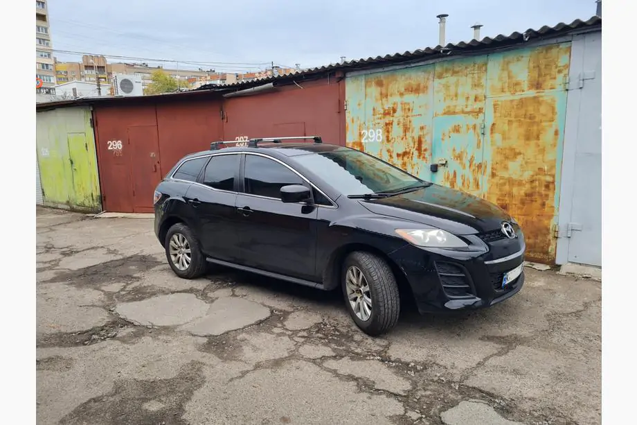 Mazda CX-7 2006-2012 гг. Поперечины на штатные места с замком Wingbar V3 (2 шт) Фото 1